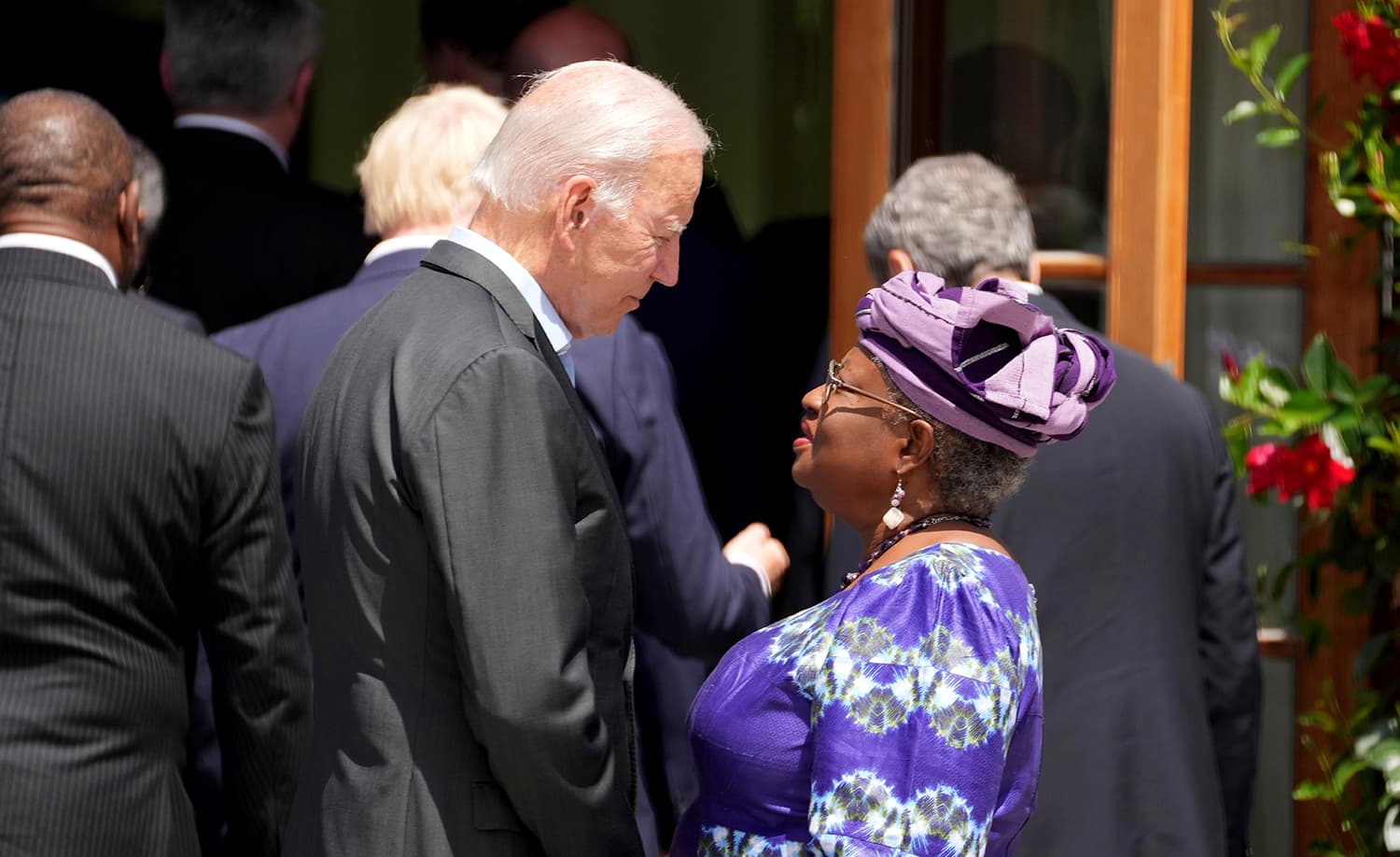 The Director General of the World Trade Organization, H.E. Dr. Ngozi Okonjo-Iweala, with US President Joe Biden. (AP)
